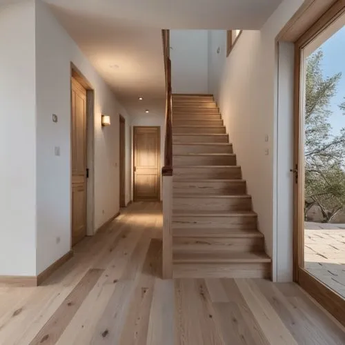 a house has wooden floors and white walls,wooden stairs,wood floor,hardwood floors,wooden floor,hallway space,wooden stair railing,Photography,General,Realistic