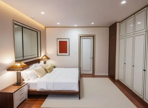 Bedroom with modern interior, decorative modern false ceiling, sliding door wardrobes opposite bed, wall art with lights and one doors to bathroom and one for entry, white aluminum triple casement win