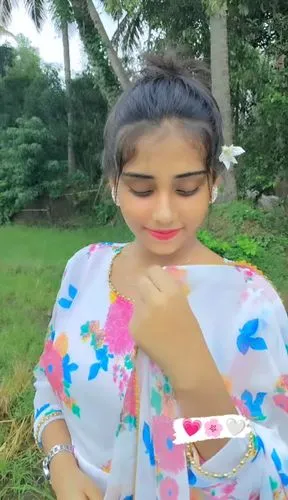 pooja,neha,holding a coconut,humita,kerala,blowing glitter,video,kandy,janmastami,coconut milk,kamini,woman eating apple,veena,srilanka,coconut perfume,bali,pongal,kamini kusum,ubud,video scene