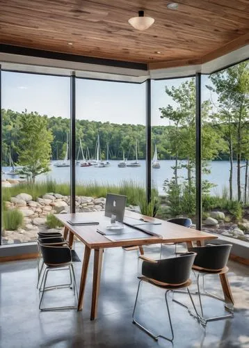 Lake Delton, Wisconsin, modern architectural design consultants office, glass building, large windows, wooden accents, minimalistic interior, conference room, whiteboard, ergonomic chairs, laptops, co