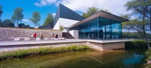 RIO CON CORRIENTE
,people are walking on the path outside the building,epfl,futuristic art museum,adjaye,gulbenkian,libeskind,jasenovac