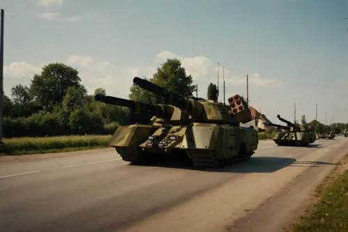 Tank column proceeding the road in small European village,tanks traveling on an empty country road next to trees,mowag,kubinka,mammoth tank,GDI,tiberian dawn