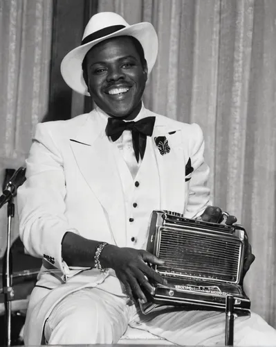 "DeFord Bailey, Grand Ole Opry House, Opryland, Nashville, Tenn., 1974. ""A member of the original Grand Ole Opry cast, DeFord Bailey was discovered in 1926 playing harmonica while operating an elevat