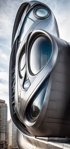 futuristic architecture,futuristic art museum,steel sculpture,tiger and turtle,walt disney concert hall,jewelry（architecture）,disney concert hall,disney hall,baku eye,big marbles,helix,mercedes-benz m