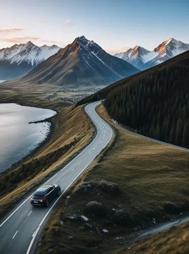 a car driving down a curved mountain road,bernina pass,alpine drive,mountain highway,mountain pass,winding roads,steep mountain pass