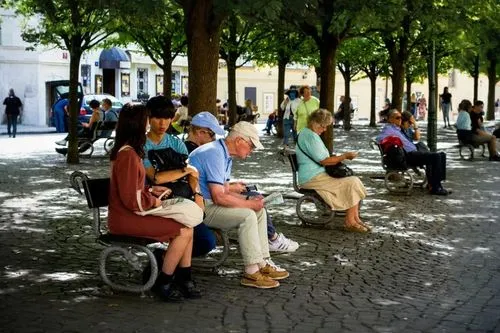 people reading newspaper,public space,men sitting,man on a bench,pensioners,nauerner square,french tourists,elderly people,pedestrian zone,place saint-pierre,street furniture,peter's square,street musicians,people talking,münsterplatz,montmartre,salzburg,aix-en-provence,street scene,vilnius