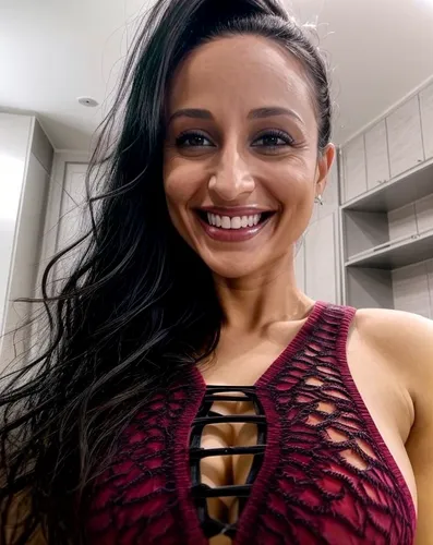 a beautiful woman in a red top standing in a kitchen,roimata,zelina,suguna,nalini,tiarra,siana