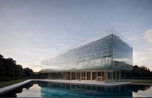 glass facade,glass building,glass facades,structural glass,water cube,glass wall,glass blocks,chancellery,glass pyramid,autostadt wolfsburg,mclaren automotive,aqua studio,glass panes,modern architectu