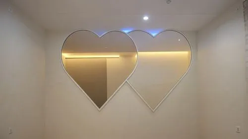 Convert this layout into a real gypsum decor for a room with hidden lighting.,a mirror with two hearts hanging over it,wall lamp,wall light,heart shape frame,heart bunting,lovemark,heart design,Photog