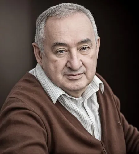 the man is wearing a brown sweater and has a brown shirt,zahidov,primakov,kudayev,korchnoi,rakhimov,kontsevich,Common,Common,Photography