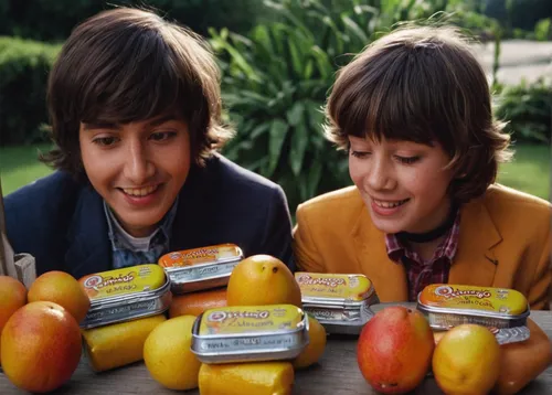 Create a lighthearted dialogue between two friends who try Altoids Mango Sours for the first time.,orange juice,fruit jams,fruit butter,canned food,guava jam,margarine,apple sauce,juicy citrus,grapefr