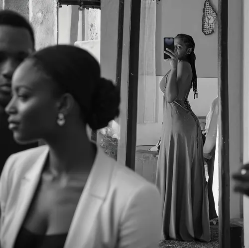girl in a long dress from the back,wedding photographer,bride getting dressed,video scene,in the mirror,rwanda,mannequin silhouettes,pre-wedding photo shoot,the mirror,behind the scenes,mirror,mirrors,wedding details,taking pictures,video clip,taking photos,cinematography,nairobi,black models,backstage