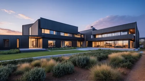 majority exterior walls are black corrugated sheeting,dunes house,modern house,modern architecture,cube house,landscape design sydney,landscape designers sydney,cubic house,corten steel,timber house,s