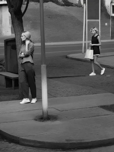 Bright b&w photography in maximum resolution and sharpness.,the two women are waiting to go to work,girl walking away,little girls walking,little girl running,people walking,pedestrian,woman walking,P