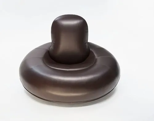 sofa,a brown rubber object sitting on top of a table,shivalingam,sivalingam,udu,bell button,bossche,chocolate fountain,3D,Modern Sculpture