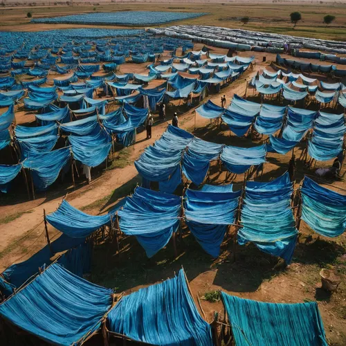 Textiles Drying In Bahawalpur, Punjab, Pakistan. The Punjab region is the economic heart of Pakistan. The textile industry accounts for more than half of exports and 20 percent of the workforce. This 