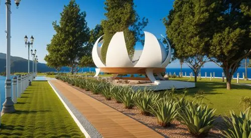 an artistic monument sits on a lawn by the water,k13 submarine memorial park,luino,chapala,mzt,mudanya,kangla,Photography,General,Realistic