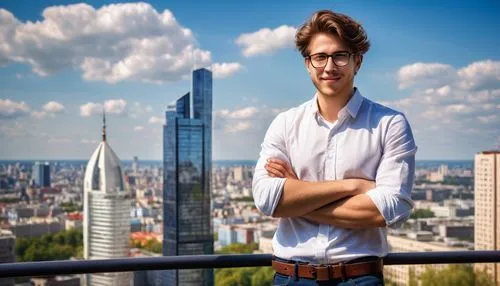 Young adult male, bachelor of architecture degree, standing confidently, black glasses, messy brown hair, casual smile, white shirt with rolled-up sleeves, dark blue jeans, brown leather belt, holding