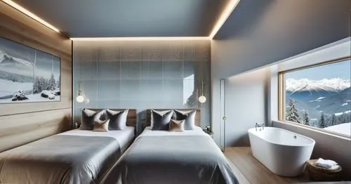 a white freestanding bathtub,the two beds have silver pillows and a bathtub,verbier,snowhotel,luxury bathroom,andermatt,laax,alpine style