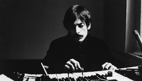 Create a dark and suspenseful story where Miguel discovers a dangerous conspiracy that threatens the existence of music.,john lennon,synthesizers,synthesizer,keyboard player,moog,analog synthesizer,on