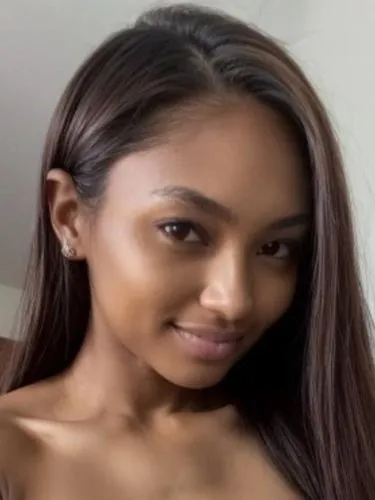 a girl posing for the camera in a white top,tiarra,mayhle,paulini,akuapem,tamika,malaika