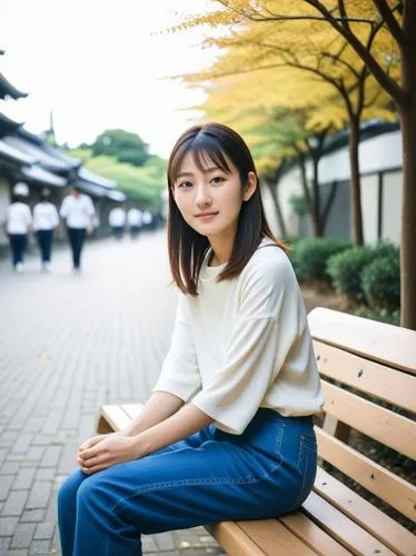 young japanese woman sits on a bench,asian girl sitting on wooden bench by sidewalk,japanese woman,eriko,sumiala,kazzia,mieko,kaori