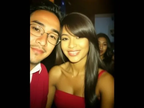 two people standing next to each other in a dark room,donaire,glassheart,amerie,yandel,pinay,blurriness