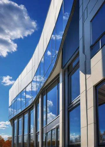 Modern Chappaqua CSD RFP 2019 building, futuristic architecture, sleek lines, glass façade, steel frames, cantilevered roof, urban landscape, cityscape, blue skies, fluffy white clouds, low-angle shot