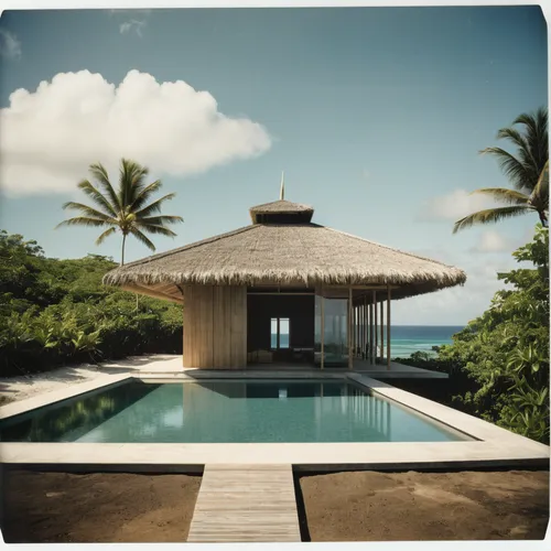 award winning architecture firm Kengo Kuma design a rectangular minimalist tropical futurist pitched palapa with open views to the ocean and vegetation. Made with thin steel structure, minimalist futu