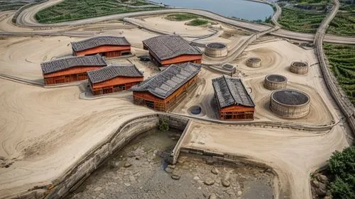 aerial perspective of a set of traditional Chinese houses with stone facade on the ground floor, wooden facade, landscaped roof , modern building,mud village,korean folk village,rice terrace,eco hotel