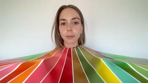 respect the pantone colors,a woman holding a colorful umbrella in front of her face,paper umbrella,color fan,winebow,leanbow,colorama,rainbow background