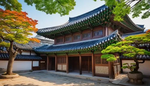 Traditional Korean architecture, hanok-style building, curved tiled roof, intricate wooden carvings, vibrant green and blue accents, ornate metal door handles, stone walls, serene courtyard, lush gree