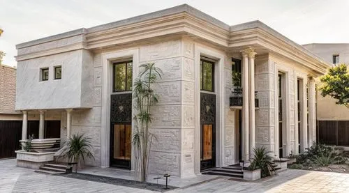 the front entrance to a house with tall columns,luxury home,gold stucco frame,stucco wall,showhouse,luxury property,exterior decoration,modern house,beautiful home,landscape design sydney,stucco frame