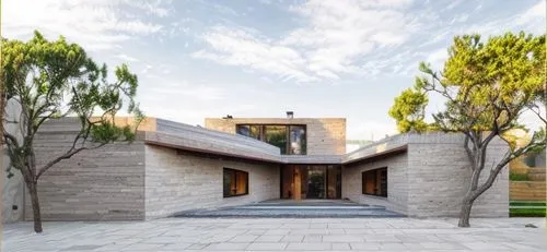 Rustic wall with rounded cobles. The 5 stairs and the patio in squared coble,iranian architecture,persian architecture,build by mirza golam pir,archidaily,dunes house,modern architecture,contemporary,