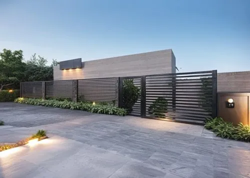 Black steel gate with horizontal veins stone wall and elegant vegetation, black steel sign, add warm lighting. On the right side there is a green metal electric power transformer, with the sky visible