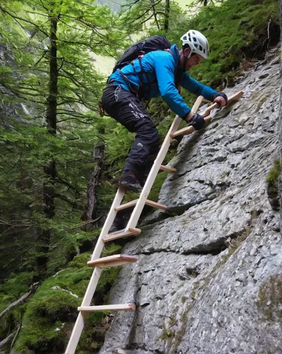 You dont get anything for free nowadays. Ladders are part of AM riding in the Alps. Photo by Dan Milner.,via ferrata,alpine climbing,climbing helmets,climbing shoe,abseiling,men climber,sport climbing