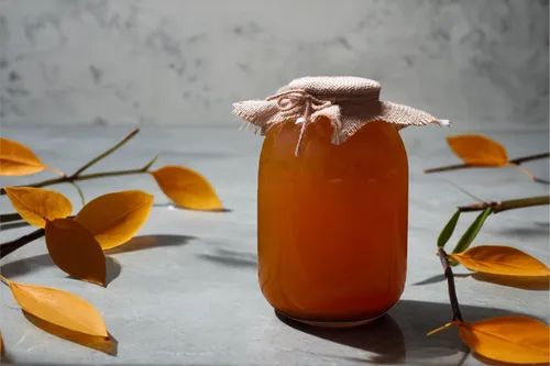 kombucha,thai iced tea,agua de valencia,apricot,carrot juice,siam rose ginger,orange bitters,fleur de sel,grapefruit juice,meyer lemon,isolated bottle,food styling,sea buckthorn,rose hip oil,confiture