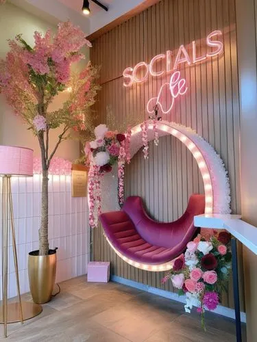 Espacio instagrameable de tienda de maquillaje de lujo con letrero luminoso y flores guirnaldas colgantes rosas espacio donde todas la chicas quieren tomarse fotos para presumir el lugar excelente ilu