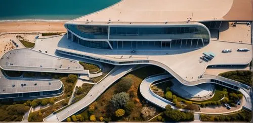 auditorio de dos pisos con concepto de oceanos y fluidez ,futuristic art museum,futuristic architecture,dunes house,guggenheim museum,modern architecture,jewelry（architecture）,house of the sea,abu-dha