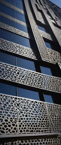 ornate metal screens, modern architectural element, intricate patterns, geometric shapes, laser-cut details, silver anodized finish, reflective surface, urban building facade, cityscape background, af