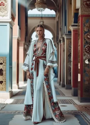 Fashion show ,a woman in a long white dress standing outside,caftans,caftan,semiramide,tahiliani,kaftan,caracalla,Photography,General,Realistic