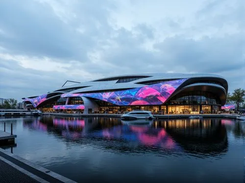 Waterfront location, futuristic boathouse, sleek metallic facade, curved lines, angular shapes, reflective glass surfaces, neon lights, vibrant colors, dynamic patterns, modern minimalist design, sust