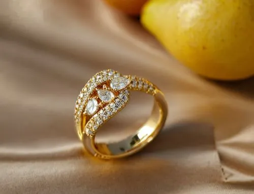 Jewelry ring with diamonds in round shape and yellow pear shap,two pears are sitting next to a pair of rings,diamond ring,ring with ornament,wedding ring,engagement ring,engagement rings,golden ring,P