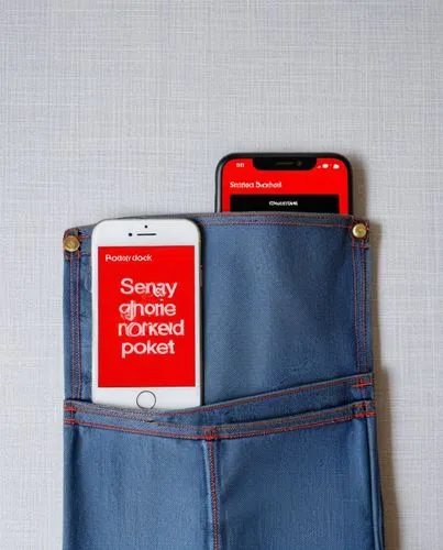 a cell phone is laying inside a pocket,passbook,jeans pocket,pocket flap,denim background,battery pressur mat,battery pack