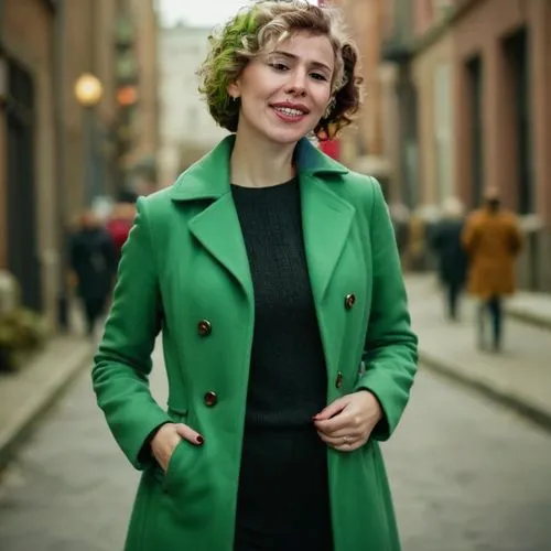 short and petite woman, green coat, short wavy hair,green jacket,woman in menswear,in green,bolero jacket,irish,green dress,lentje,green background,female doctor,coat,irish soft-coated wheaten terrier