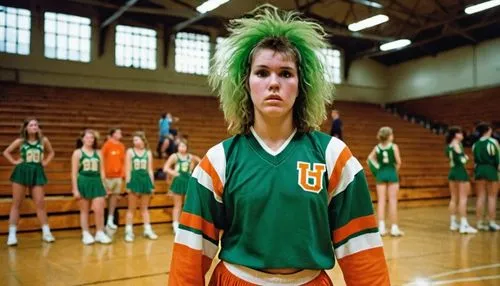 Ugly, oversized cheer uniforms, bright orange and green stripes, torn and frayed hems, worn-out knee patches, faded pom-poms, messy tangled hair, sweaty forehead, awkward posture, standing in a dimly 