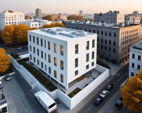 the modern building is surrounded by parking spaces,appartment building,melnikov,plattenbau,apartment building,mvrdv,bauhaus