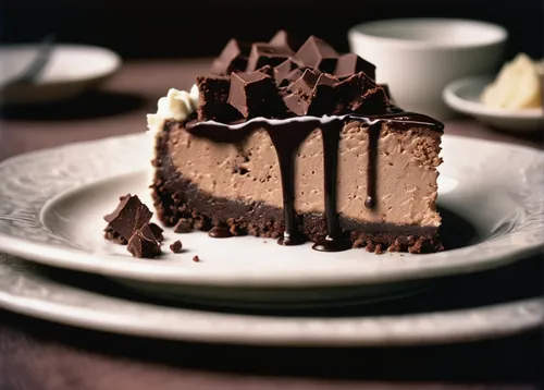 Create a tantalizing recipe for a decadent chocolate cheesecake crumble.,chocolate layer cake,chocolate cake,ice cream cake with chocolate sauce,chocolate mousse,chocolate parfait,flourless chocolate 