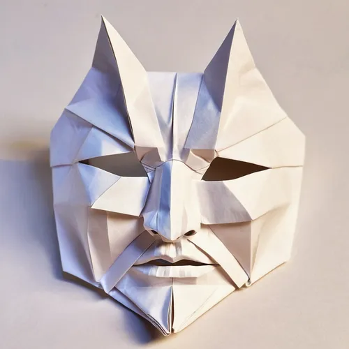 Write a review for a theraface mask that provides deep hydration and helps with dry skin.,anonymous mask,folded paper,paper art,covid-19 mask,origami,facial tissue holder,origami paper,mask,death mask