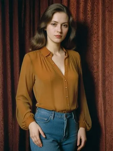 Standing woman, dressed in a blouse, but without a bra underneath, so that her aroused nipples are visible.,a woman standing against a red curtain in a blouse and jeans,rosanne,roseanne,kelso,jadzia,f